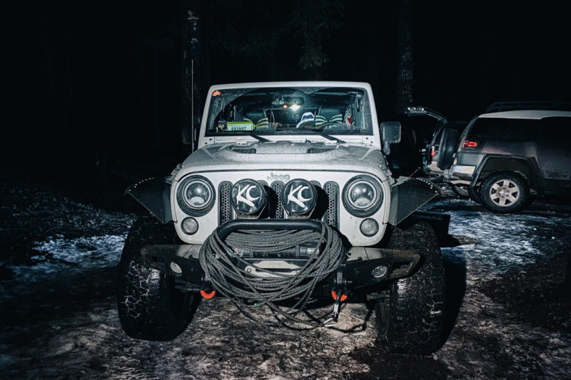Jeep Rubicon - Noah with winch cable wrapped around bull bar.