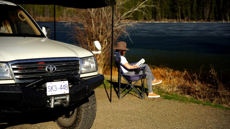 Reading by the lake camping | Overland Lady by Monique Song